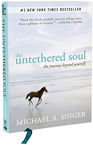 Book cover for The Untethered Soul by Michael A. Singer featuring a running horse.