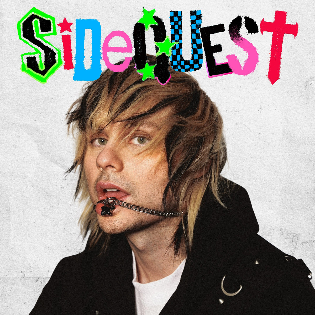 Michael Clifford portrait with colorful "SIDEQUEST" text above.