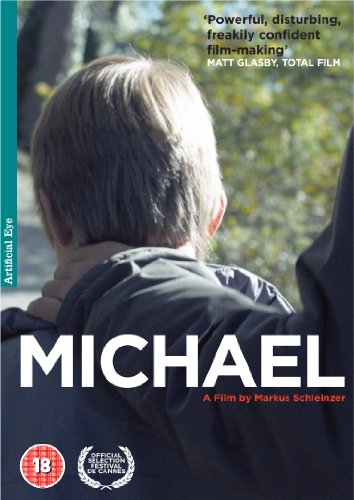DVD cover showing a person with their hand on a boy's shoulder outdoors.