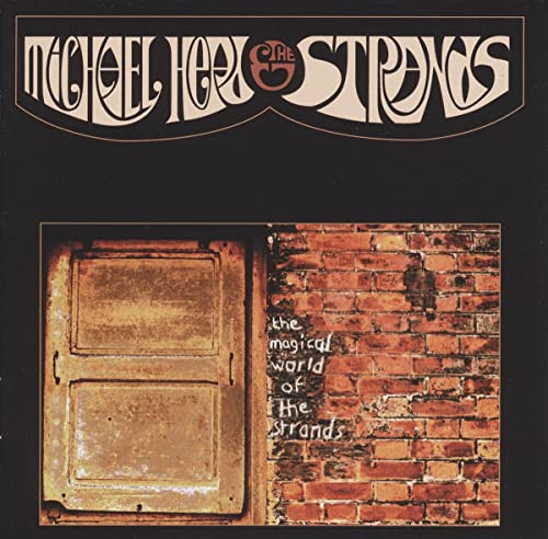 Album cover featuring stylized text above a weathered door and a brick wall.
