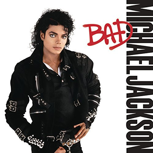 Michael Jackson wearing a black buckled jacket on the cover of his album Bad.