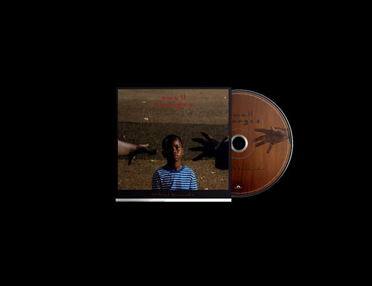 Michael Kiwanuka’s “Small Changes” CD cover with a child and shadowy hands.