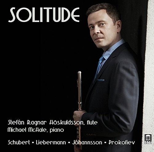 Man in a suit holding a flute, album cover with white text.