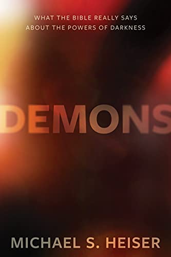 Book cover with the title Demons against a dark, smoky, red and orange background.