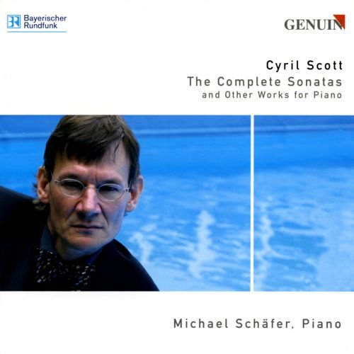 The image is a CD cover featuring a man with glasses and a bow tie.