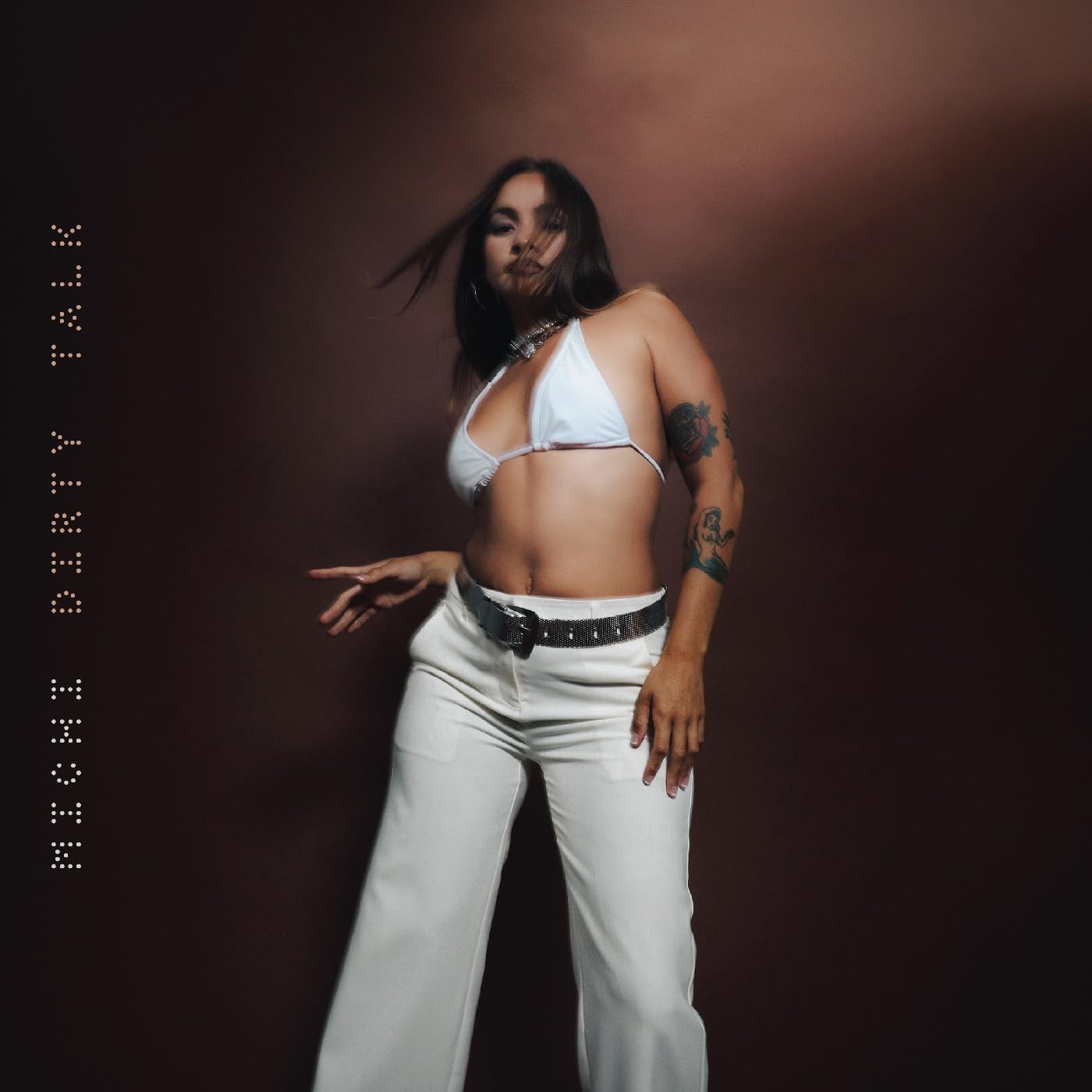 Album cover for Michi’s “Dirty Talk” featuring a woman in white clothing.