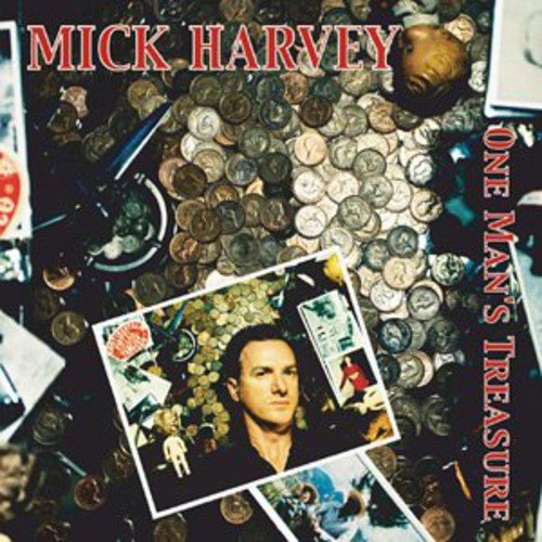 "Album cover with coins and photos, featuring a man's portrait and red text."