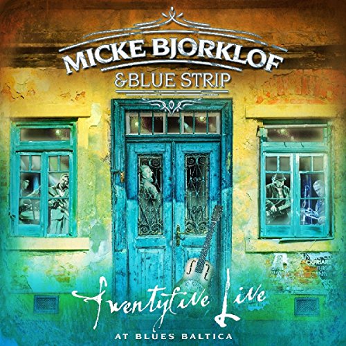 CD cover: weathered blue door with musicians reflected in windows.