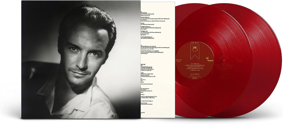 "Album cover with a black-and-white portrait and two red vinyl records."