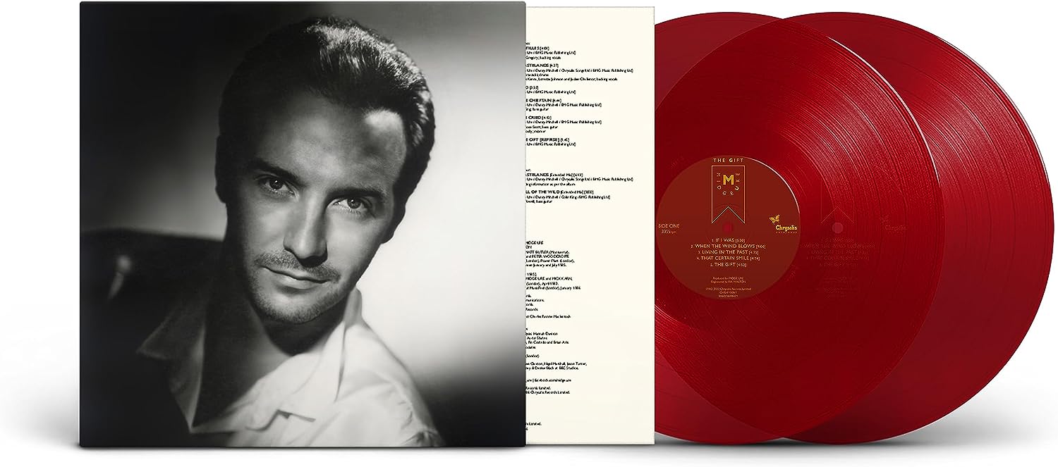 "Album cover with a black-and-white portrait and two red vinyl records."