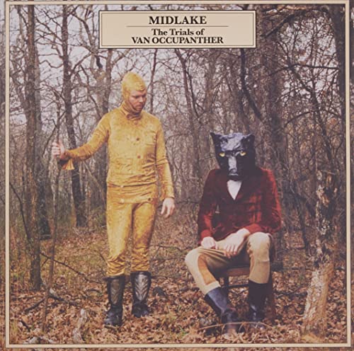 Album cover: two figures in animal masks in a forest.
