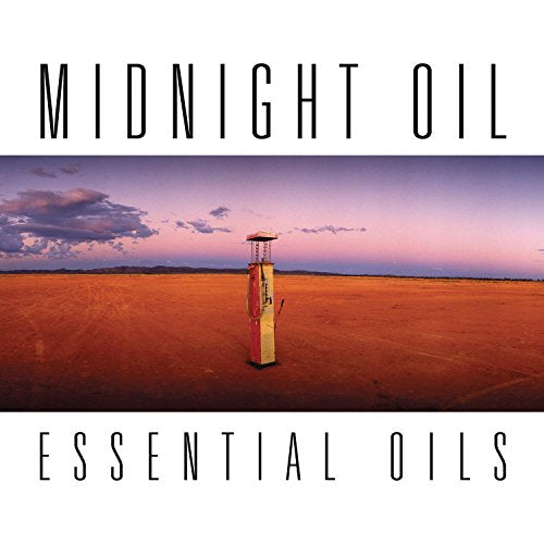 Desert landscape with old gas pump and purple sky, text reading Midnight Oil Essential Oils.