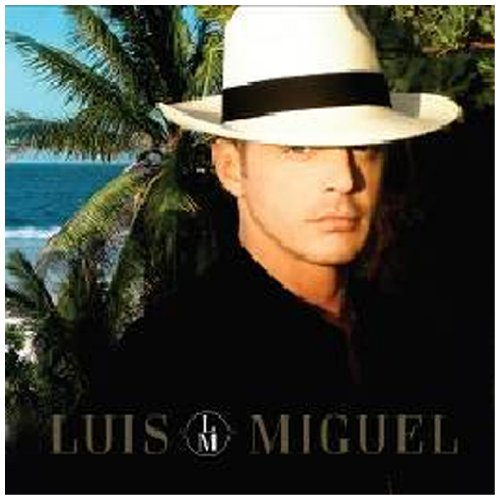 Luis Miguel CD cover: man in white hat, ocean and palm trees background.