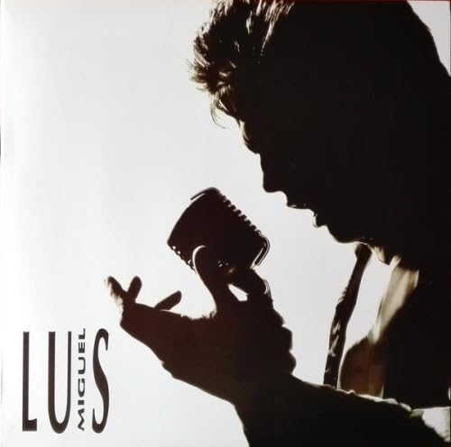 Vinyl record cover: Silhouette of a man speaking into a vintage microphone.