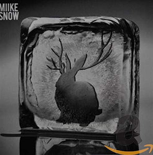 Miike Snow album cover: a deer silhouette frozen in ice.