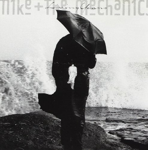 Black and white CD cover with a man, umbrella, and ghostly figure.