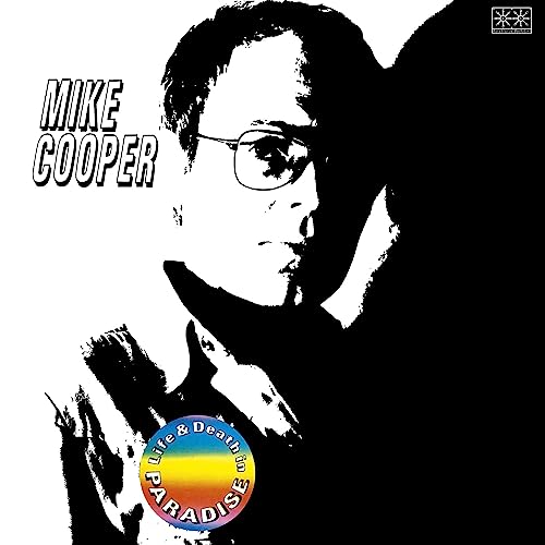 Black and white album cover featuring Mike Cooper with glasses and a circular logo.