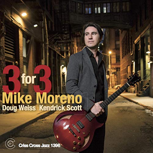 Album cover for Mike Moreno's "Three For Three" featuring a guitarist.
