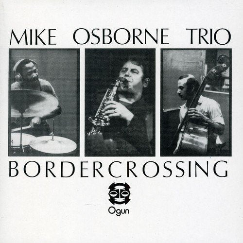 Black and white album cover featuring three jazz musicians playing instruments.