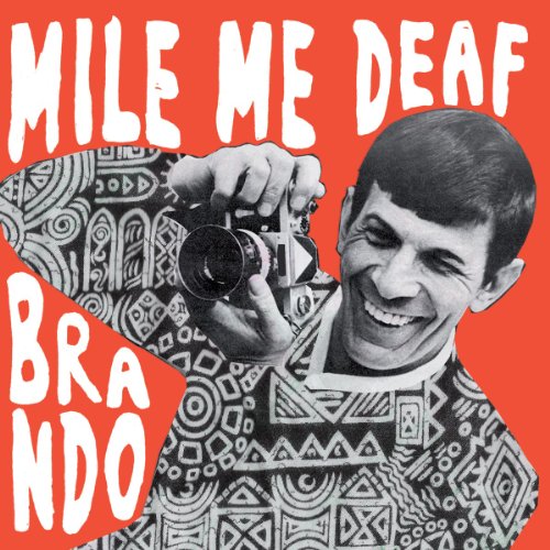 CD cover: black and white portrait of a smiling man with a camera.