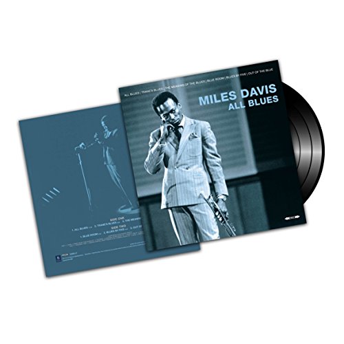 Miles Davis "All Blues" vinyl record with album cover featuring his portrait.