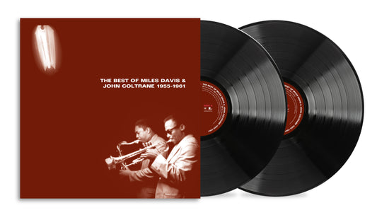 Two vinyl records and album cover featuring Miles Davis and John Coltrane.