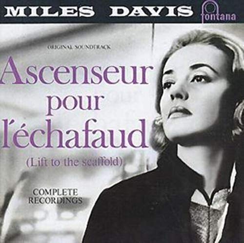 Black and white album cover featuring Jeanne Moreau with text in purple and white.