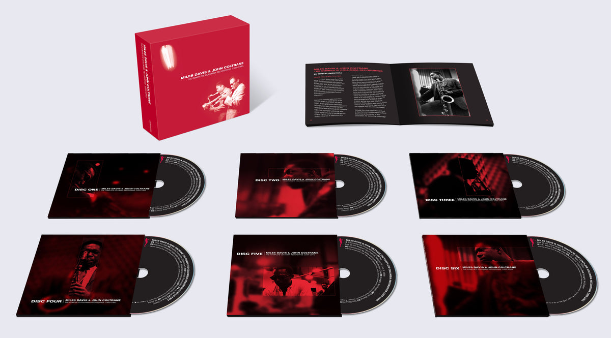 Red CD box set featuring Miles Davis and John Coltrane, with discs.