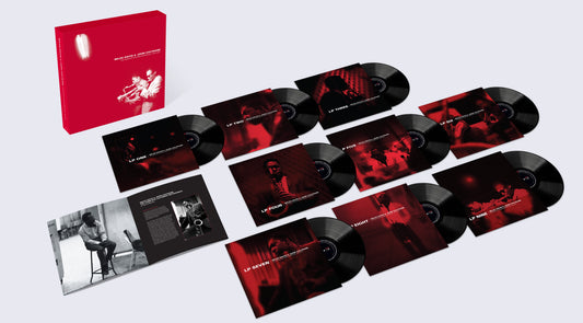 Red box set with seven vinyl records featuring Miles Davis and John Coltrane.