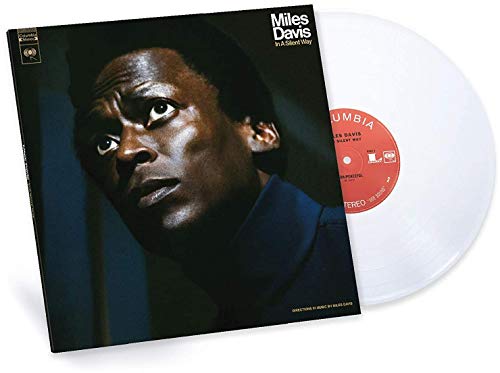 Miles Davis “In A Silent Way” album cover and white vinyl record.