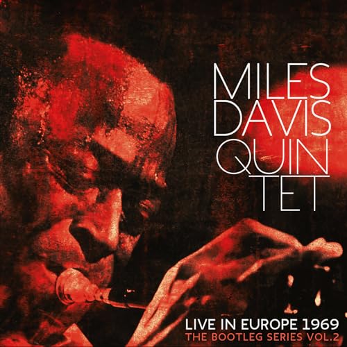 Red-toned album cover featuring Miles Davis playing a trumpet.