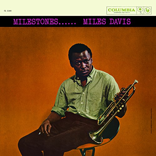 Miles Davis album cover: portrait of Davis with his trumpet, orange background.