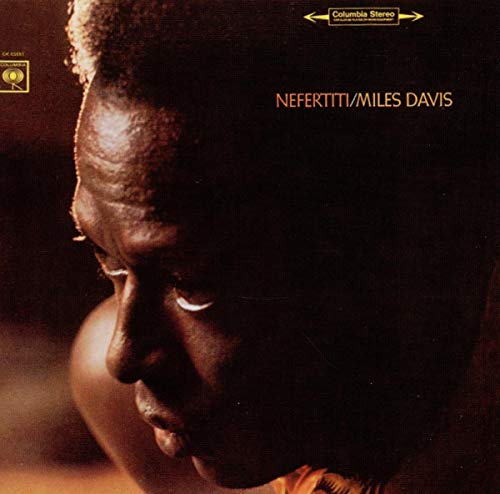 Album cover for Miles Davis’ “Nefertiti” featuring a portrait of a man.