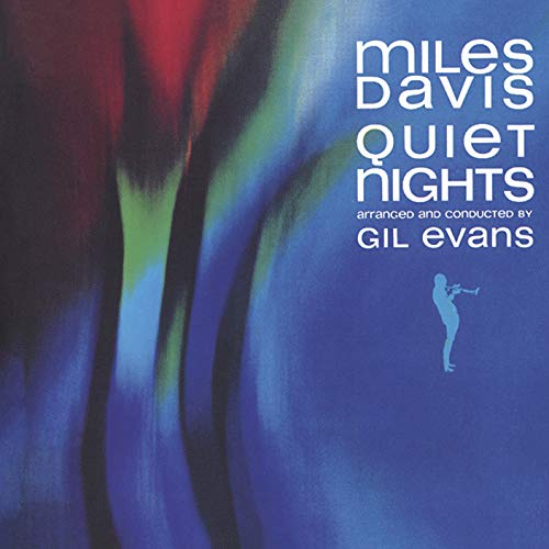 CD cover for Miles Davis’ “Quiet Nights” with abstract art and silhouette.