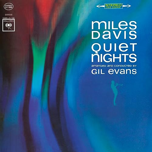 Miles Davis’ “Quiet Nights” vinyl album cover with abstract colorful design.