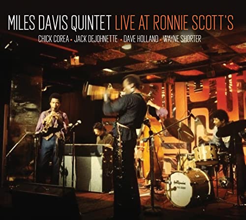CD cover of Miles Davis Quintet performing live on stage.