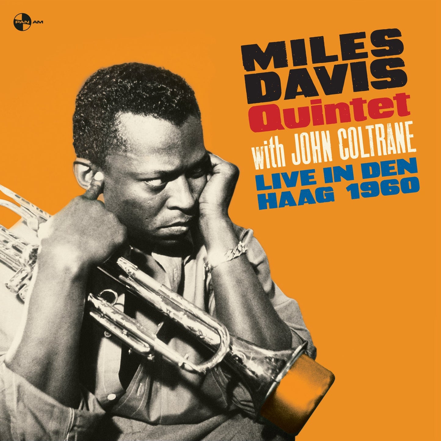 Miles Davis playing trumpet on album cover, orange background with text.
