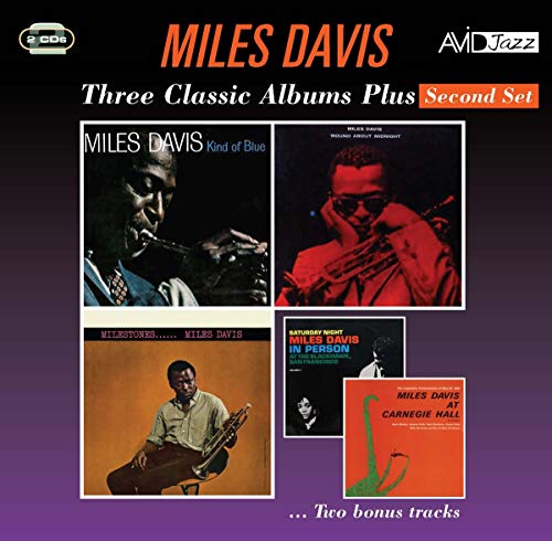 CD cover showing four Miles Davis album artworks against a dark purple background.