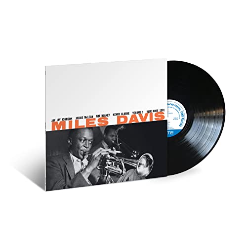 Miles Davis vinyl record with album cover featuring a portrait of the artist.