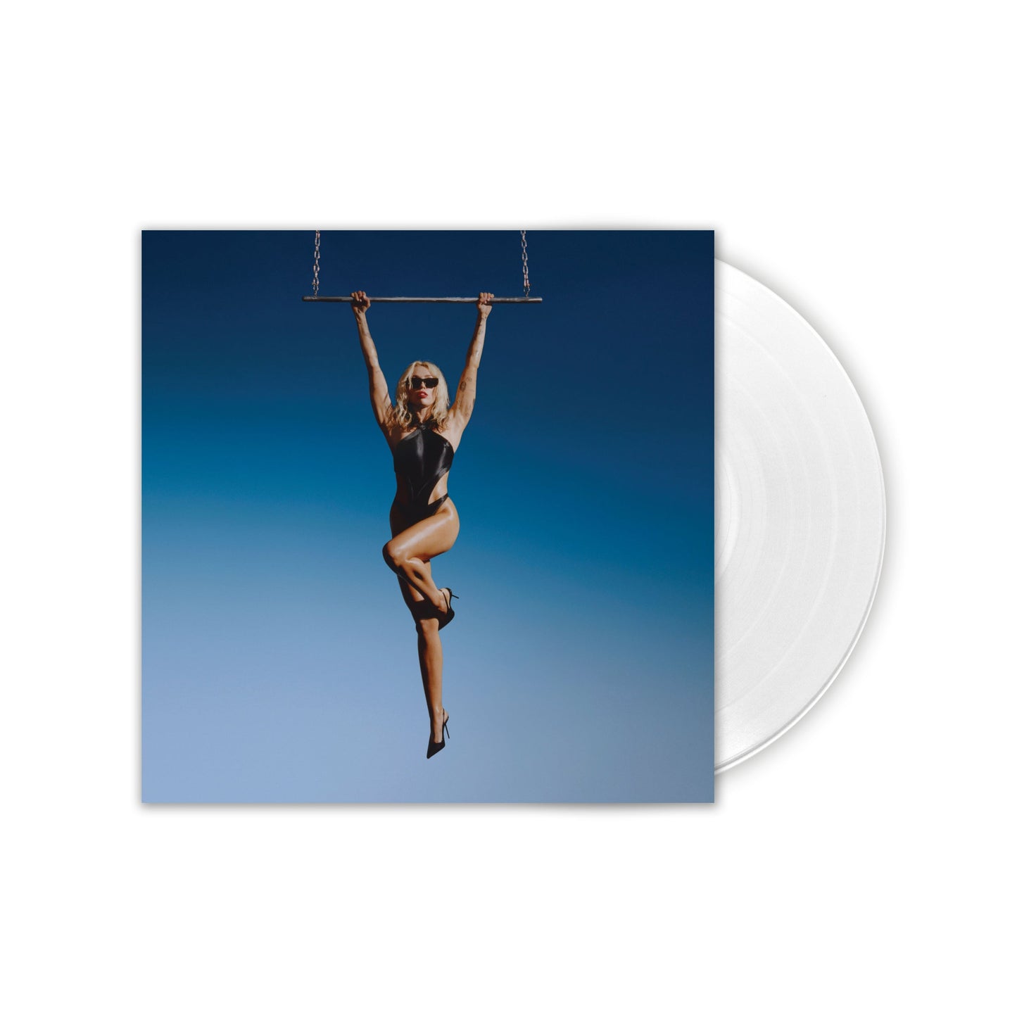 White vinyl record with album cover featuring a woman on a swing.