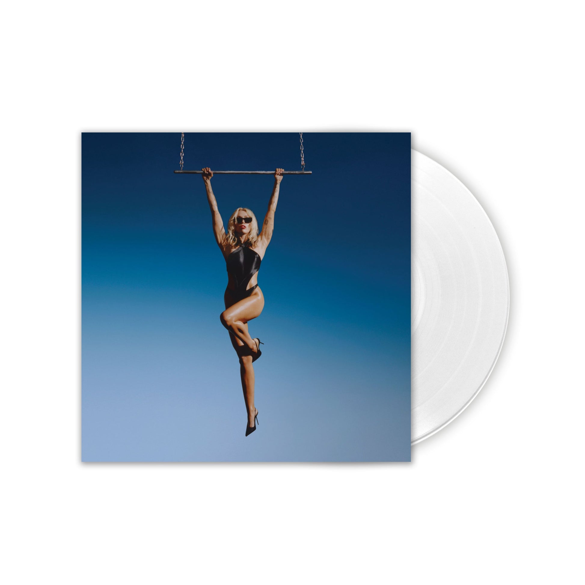 White vinyl record with album cover featuring a woman on a swing.