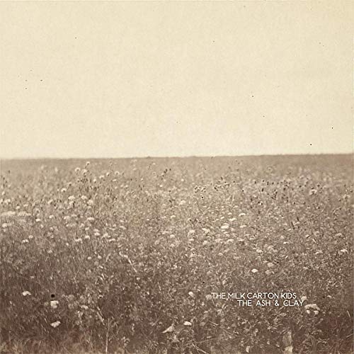 Sepia-toned album cover with a field of wildflowers and text.