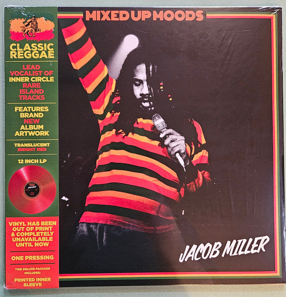 Red vinyl record with album cover featuring Jacob Miller in striped shirt.