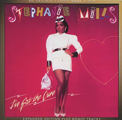 Stephanie Mills dressed as a nurse on a pink background with a heart outline.