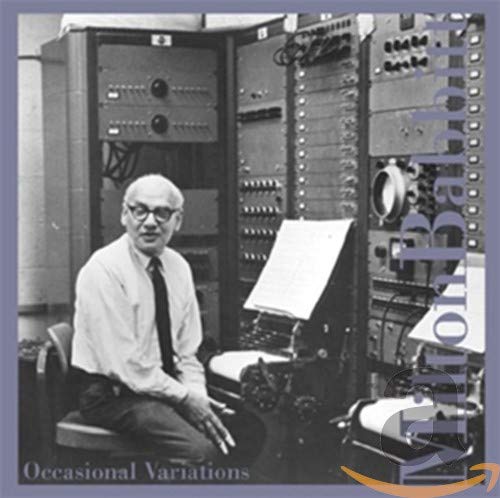 Black and white photo of composer Milton Babbitt with electronic music equipment.