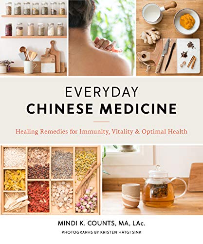 Book cover with herbs, tea, and a person receiving back massage.