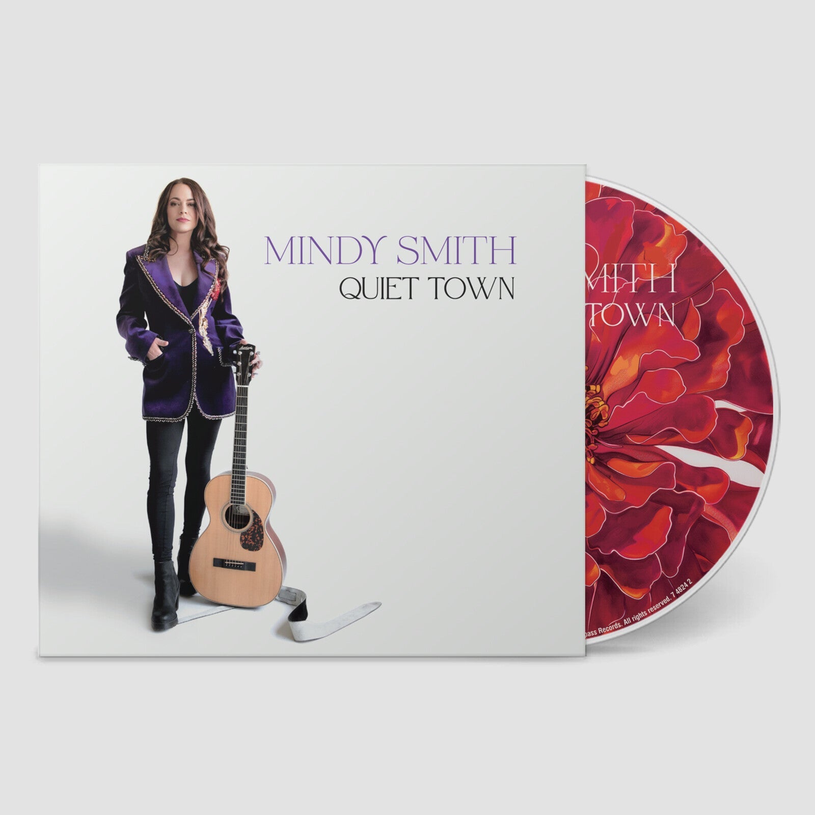 Mindy Smith's "Quiet Town" CD case with artist portrait and floral disc.