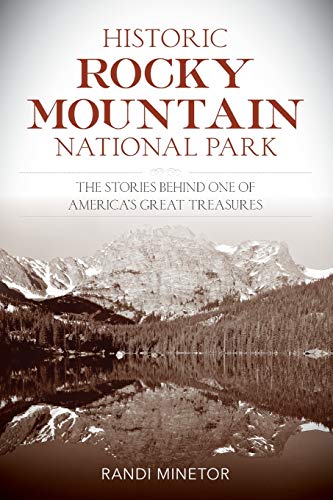 Book cover with snowy mountains reflected in a still lake.