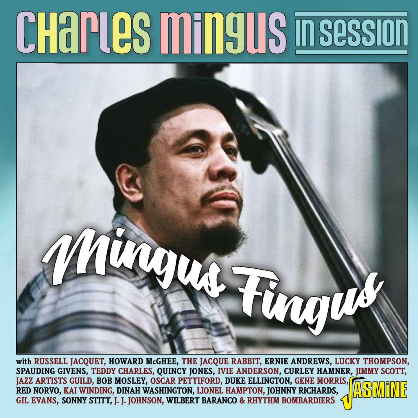 Charles Mingus album cover, portrait of Mingus with bass, blue background.