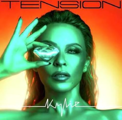 Kylie Minogue album cover, “Tension”, featuring a green-toned portrait.